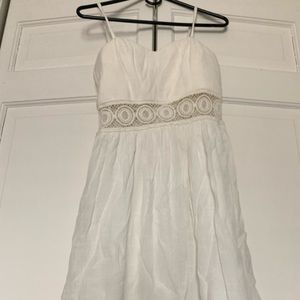 White dress with mid lace cut